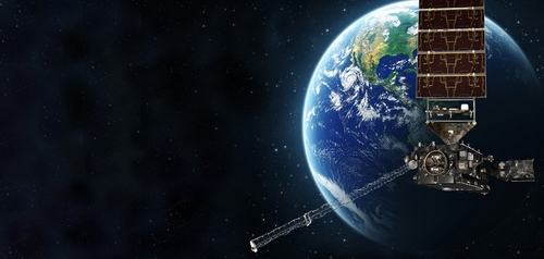 Artist's rendition GOES-R satellite in orbit above Earth with a starfield in the background